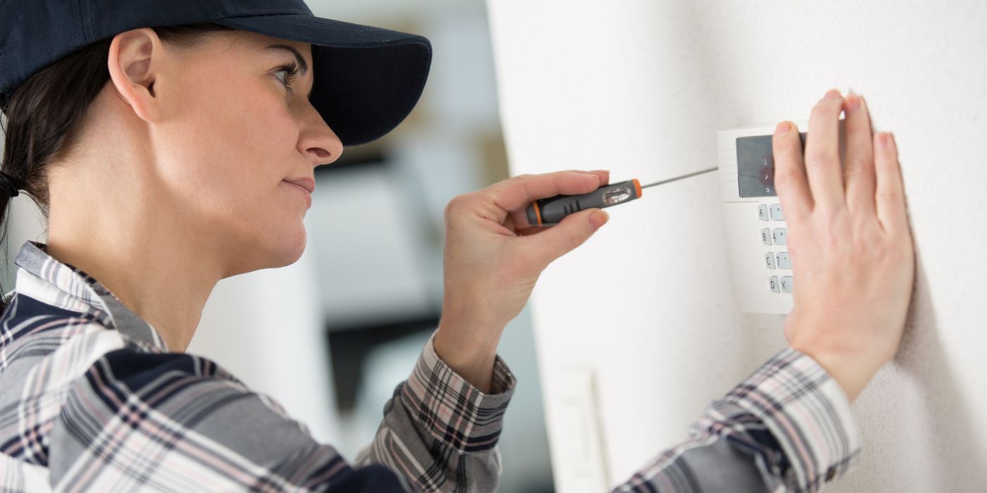 maintenance personnel installing smart device