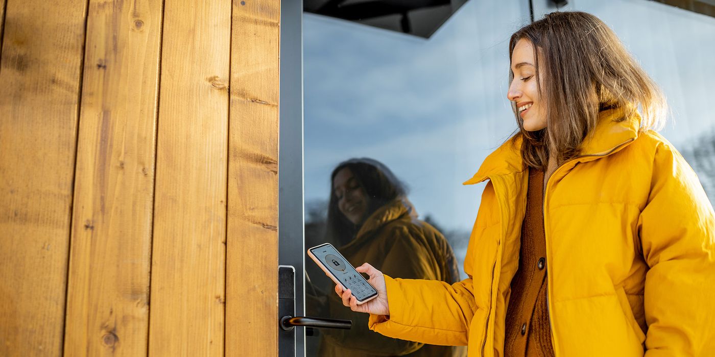 women accessing vacation rental via a smart lock