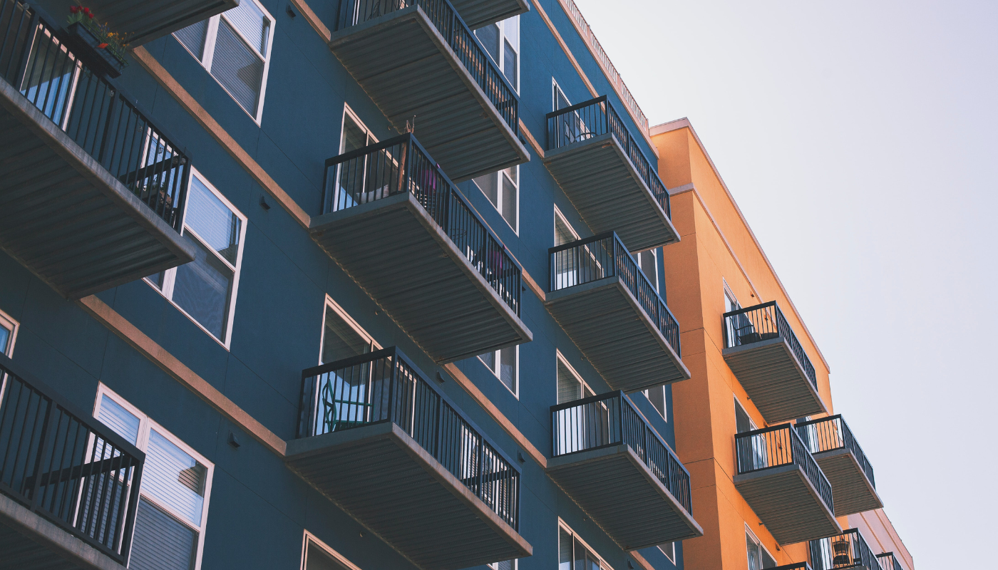 apartment building exterior meant to depict energy efficiency